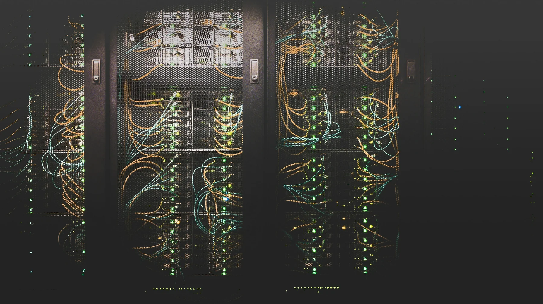 Detailed view of network cables and equipment inside server racks